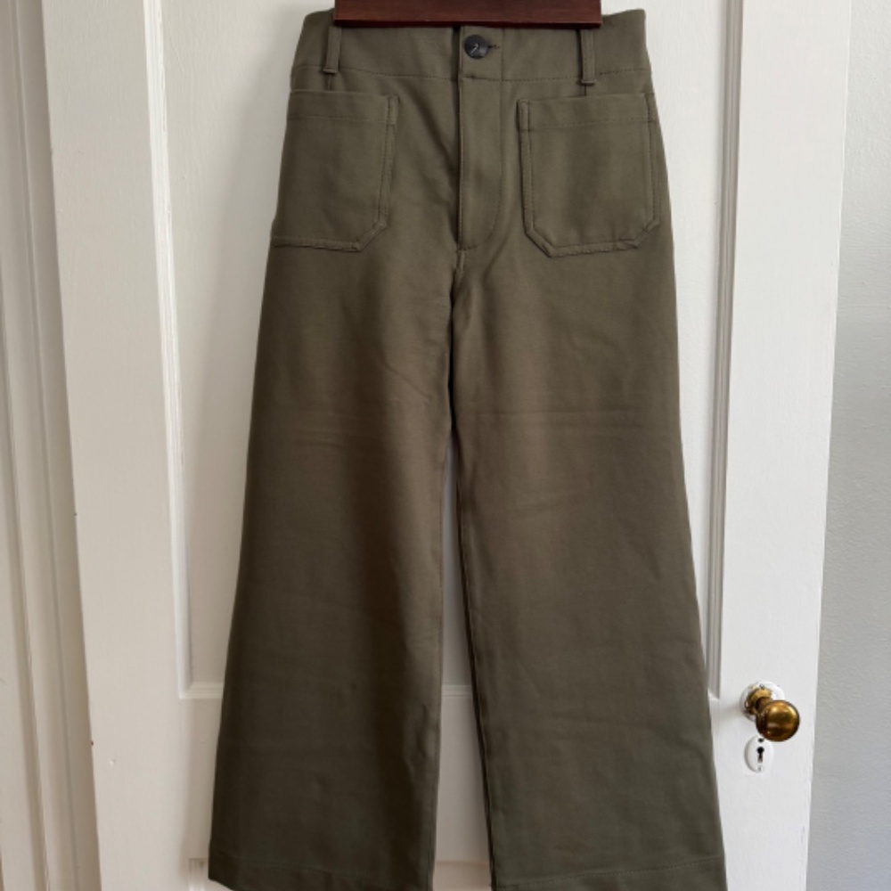 Anthropologie Maeve Colette pants in olive green.
